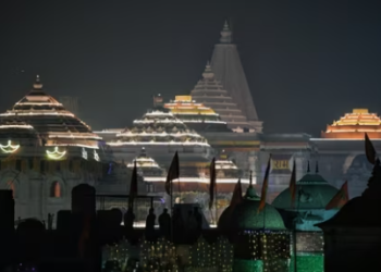 Ram Temple illuminated on Sunday, on the eve of the pran-pratishtha ceremony in Ayodhya.