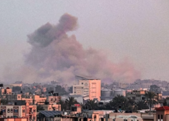 A picture taken from Rafah shows smoke billowing over Khan Yunis in the southern Gaza Strip during Israeli bombardment.(AFP)