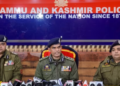 J&K Additional Director General of Police (ADGP) Vijay Kumar (C) with Inspector General of Police (IGP) V.K. Birdi addresses a press conference.