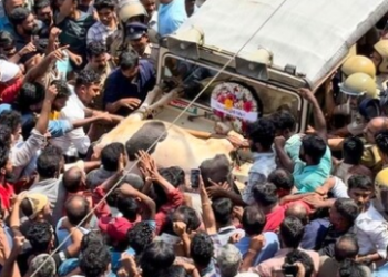 People block a forest officials vehicle during district-wide hartal at Pulpally, in Wayanad district, Saturday, Feb. 17, 2024.