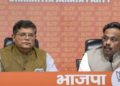 BJP national general Secretary Vinod Tawde (right) announces the party’s first list of candidates for the upcoming Lok Sabha elections at a press conference in New Delhi on Saturday. (PTI)