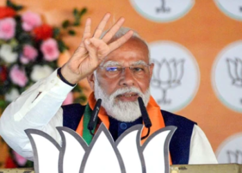 Prime Minister Narendra Modi addresses a public meeting in support of Janata Dal