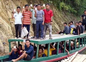Voters on their way to polling station to cast their votes via boat for the second phase of Lok Sabha Polls at Korbuk in East Tripura on Friday. (ANI)