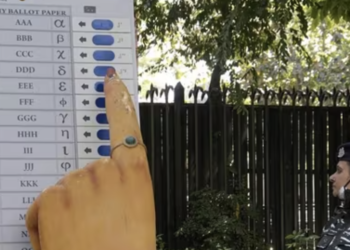 A model of an Electronic Voting Machine (EVM) outside the Election Commission of India (ECI) office in New Delhi. (PTI)