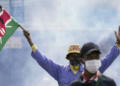 An anti-government protester waves a Kenyan flag