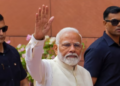 Prime Minister Narendra Modi gestures upon his arrival at the Parliament House complex in New Delhi on June 24, 2024. (PTI)
