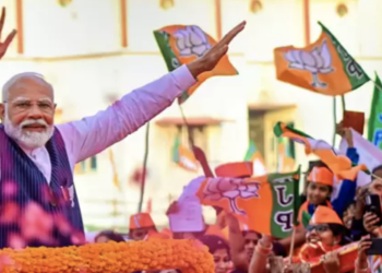 Prime Minister Narendra Modi celebrates after NDA alliance wins majority in LS polls