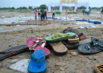 Shoes are pictured where a stampede killed people during a sermon at Hathras on July 3, 2024. (AFP)