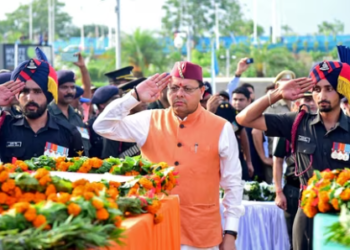 Uttarakhand CM Pushkar Singh Dhami pays last respect to the mortal remains of the five soldiers of state who lost their lives in the Kathua terrorist attack. (ANI Photo)