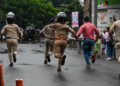 A clash took place between the police and local residents amid an agitation over the sexual assault of two four-year-old girls in Badlapur. (Photo by Raju Shinde,HT Photo)