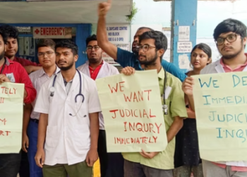 Junior doctors and medical students stage a protest outside North Bengal Medical College