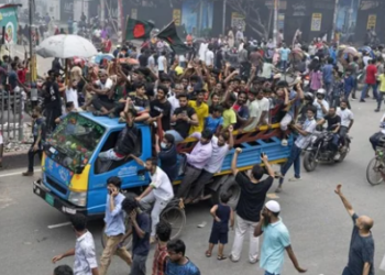 Protesters celebrate after news of Prime Minister Sheikh Hasina's resignation, in Dhaka, Bangladesh, on Monday. (AP)
