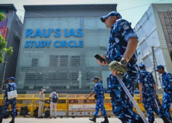 Security officials seen deployed at Rau's IAS Study circle where allegedly 3 UPSC aspirants were drowned to death(Sanchit Khanna,Hindustan Times)