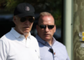 US President Joe Biden (L) departs the beach on August 10, 2024, in Rehoboth Beach, Delaware. (AFP)