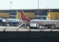 An IndiGo aircraft and an Air India Ltd. aircraft on the tarmac at Indira Gandhi International Airport in New Delhi.(Bloomberg)