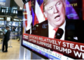 FILE - An image of President-elect Donald Trump appears on a television screen on the floor of the New York Stock Exchange, Nov. 9, 2016. (AP Photo/Richard Drew, File)(AP)