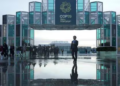 Attendees arrive for the day at the COP29 UN Climate Summit on November 14 in Baku, Azerbaijan. (AP)
