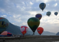 Hot air balloons rise in sky during the international festival at Pokhara in Nepal. (Photo by PRAKASH MATHEMA / AFP)
