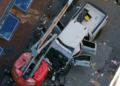 A black flag with white lettering lies on the ground rolled up behind a pickup truck that a man drove into a crowd on Bourbon Street in New Orleans, killing and injuring a number of people, early Wednesday morning, Jan. 1, 2025. The FBI said they recovered an Islamic State group flag, which is black with white lettering, from the vehicle. (AP)